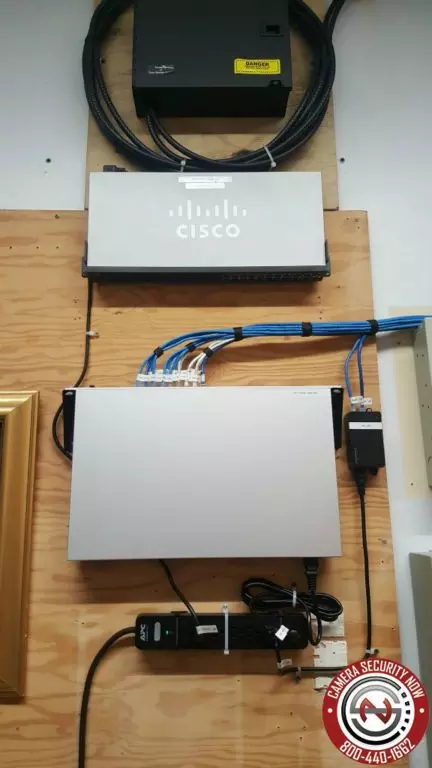 Experts installing security cameras