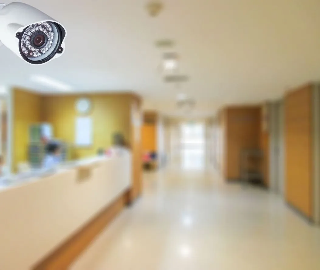 Hospital corridor monitored by commercial security cameras