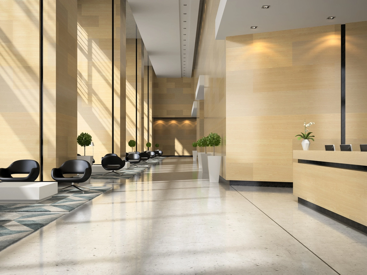 Commercial lobby and front-desk area monitored by security cameras