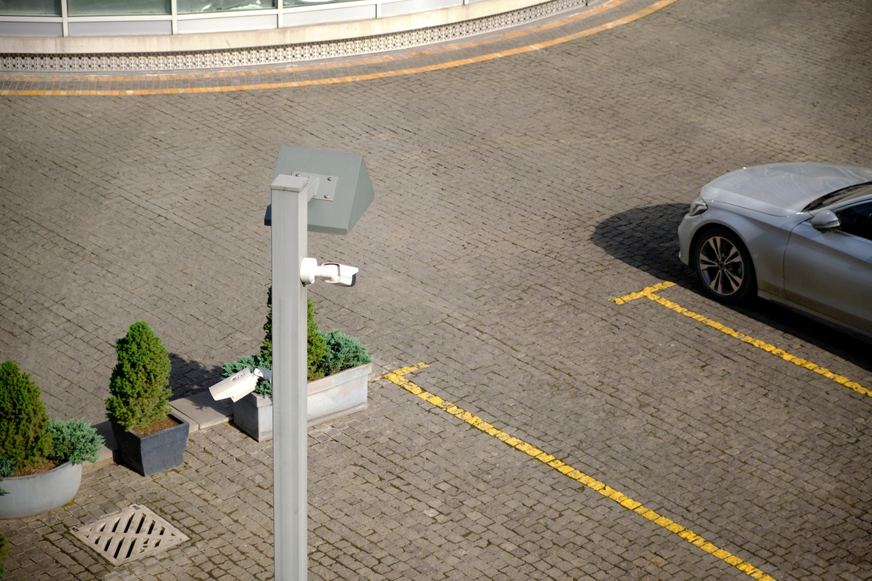 4K security camera monitoring commercial building entrance