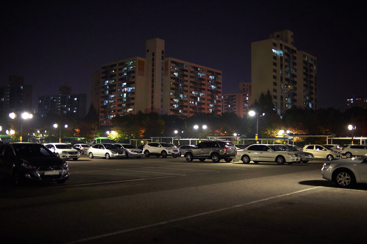commercial parking lot monitored with motion-based security cameras