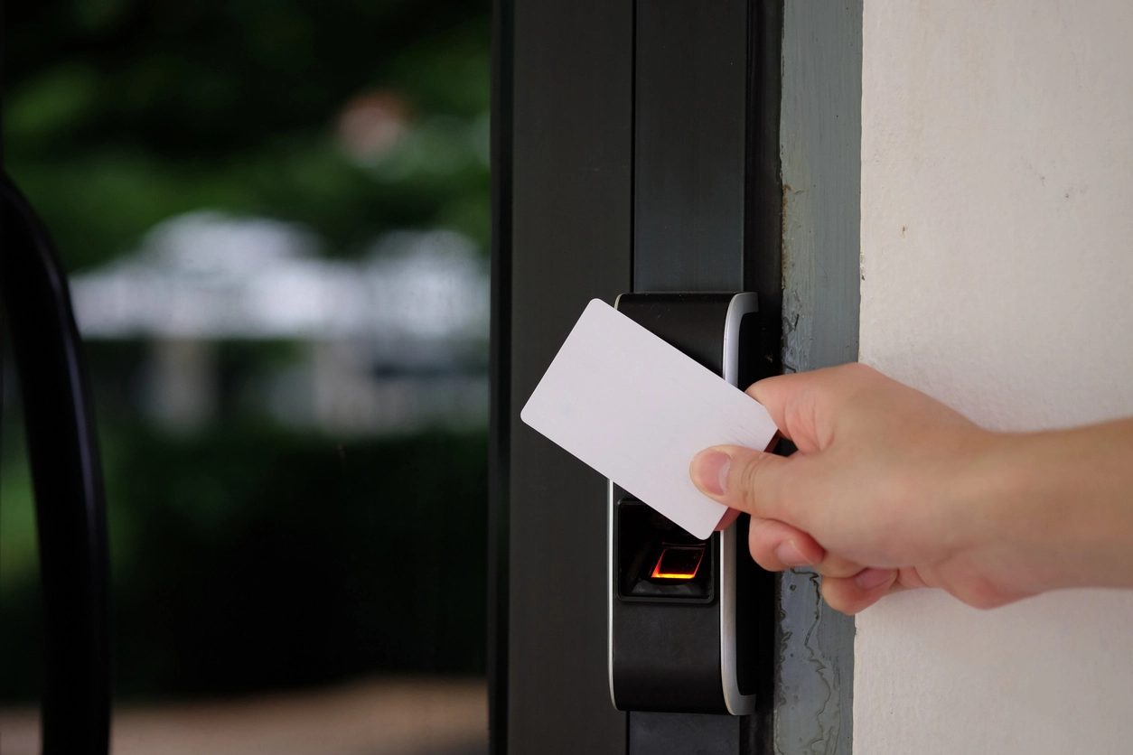 Commercial access control reader installed at a secured business entrance