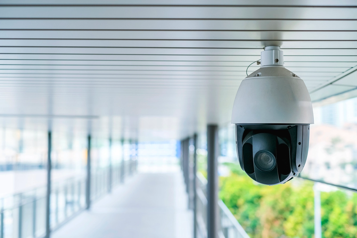 security camera monitoring controlled access door inside courthouse