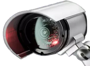 An infrared security camera with a red LED illuminated within
