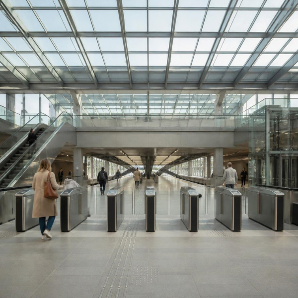 transit facility entrance with metal detector screening