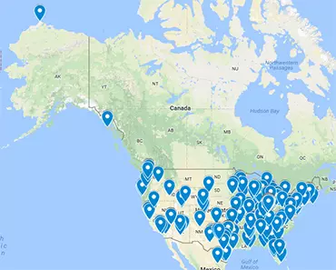 A map of North America with pins placed across the continent